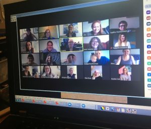 Photo of multiple staff in a virtual meeting